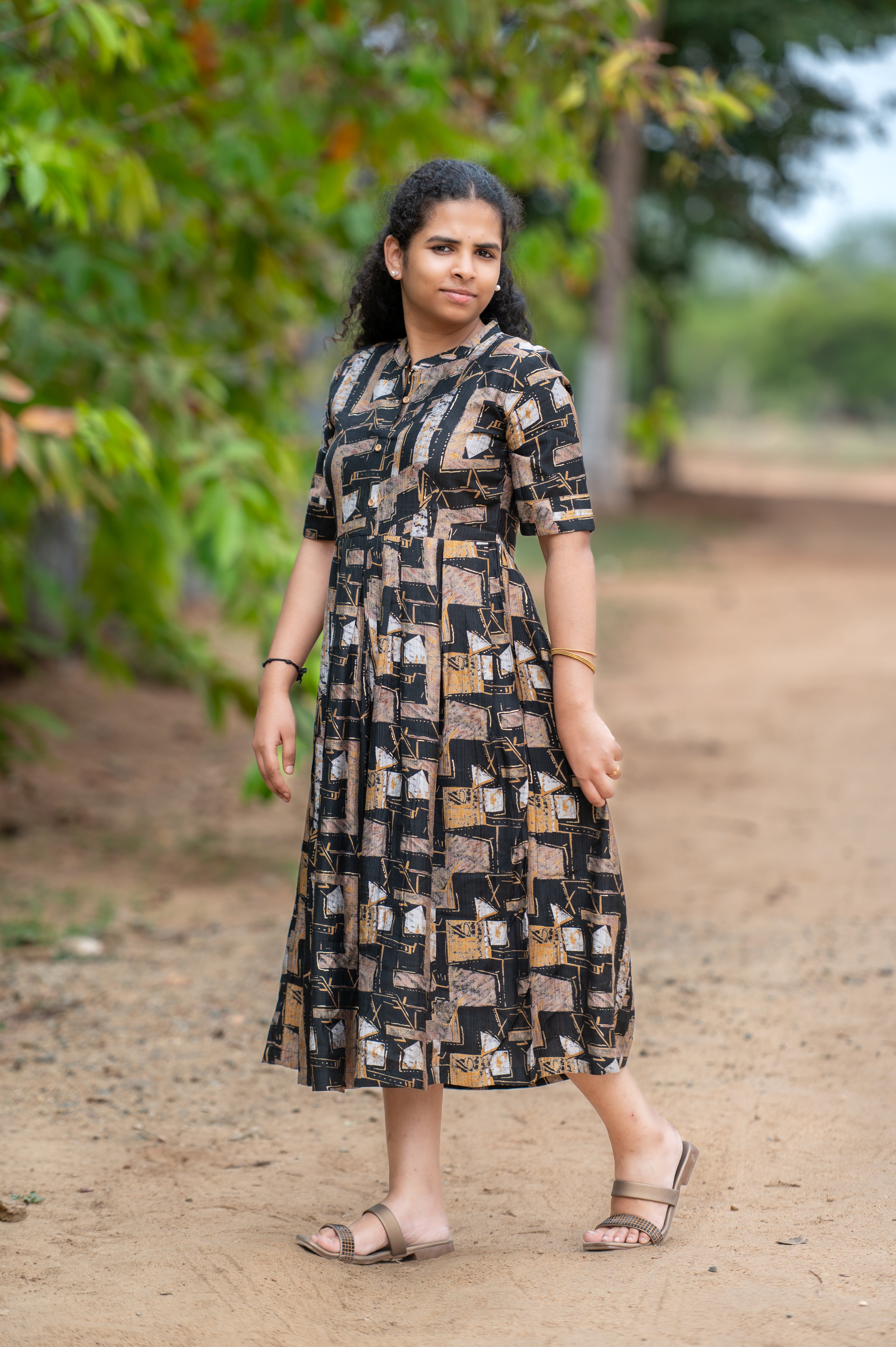 👚 Black Golden Aura Abstract Midi